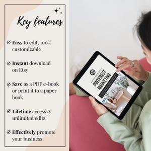 May include: A digital tablet displaying a guide to Pinterest marketing. The guide is titled "A Beginners Guide to Pinterest Marketing". The tablet is being held by a person's hands. The image has a pink background with a list of key features on the left side of the image.