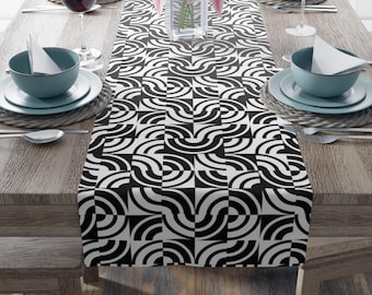 Table Runner (Cotton, Poly)  Bold black and white geometric table runner, perfect for adding a modern, minimalist touch to any dining space.