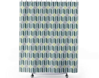 Shower curtain with a repeating geometric pattern in Bauhaus style, in gray-green tones.