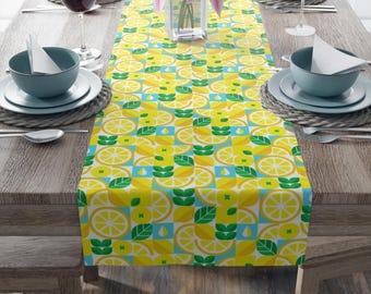 Table Runner (Cotton, Poly)  Fun and refreshing table runner with bright lemons and leaves in a geometric style to brighten up any space