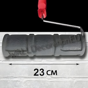 May include: A gray paint roller with a red handle, measuring 9 inches in length. The roller is designed with a textured pattern. The image includes the text "WALLDecor.EU" and "23 cm".