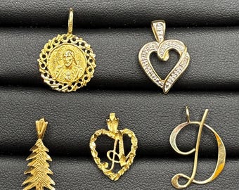You pick one: pendant/charm in solid gold
