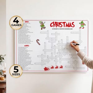 Puede incluir: Un tablero rectangular blanco de crucigrama navideño con texto y gráficos en rojo, incluyendo un bastón de caramelo, el trineo de Santa y elfos. El tablero presenta una lista de pistas y una cuadrícula para escribir las respuestas.