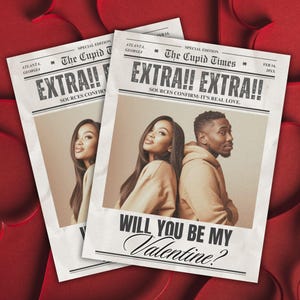 May include: Two newspaper-style Valentine's Day cards with the headline "EXTRA!! EXTRA!!" and the text "WILL YOU BE MY Valentine?" The cards feature a photo of a couple. The background is a red heart pattern.