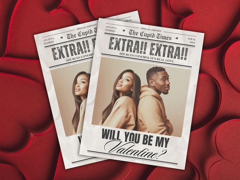 May include: Two newspaper-style Valentine's Day cards with the headline "EXTRA!! EXTRA!!" and the text "WILL YOU BE MY Valentine?" The cards feature a photo of a couple. The background is a red heart pattern.