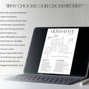 K&ouml;nnte beinhalten: Ein digitales Kreuzwortr&auml;tsel, das auf einem Tablet angezeigt wird. Das Kreuzwortr&auml;tsel ist f&uuml;r eine Hochzeit, mit den Namen Olivia und Dave oben. Das Tablet befindet sich auf einer Tastatur, mit einem Stift in der N&auml;he. Auf dem Bildschirm steht "Cheers & Clues".