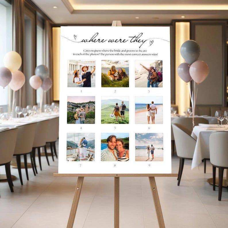May include: A white sign on a wooden easel with the text "where were they" and nine photos. The sign is for a wedding game. The photos show couples in various locations. Balloons and tables are in the background.