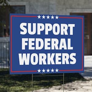 May include: A blue and red yard sign with white text that reads "SUPPORT FEDERAL WORKERS" with five white stars above and below the text.