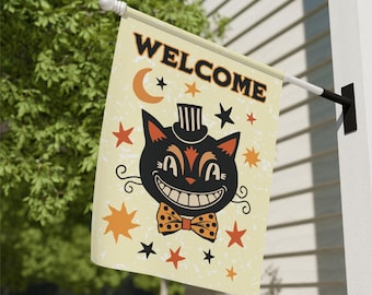 May include: A Halloween-themed welcome flag featuring a black cat wearing a top hat and bow tie. The flag has a cream background with orange, black, and white stars. The text "Welcome" is written in black letters.