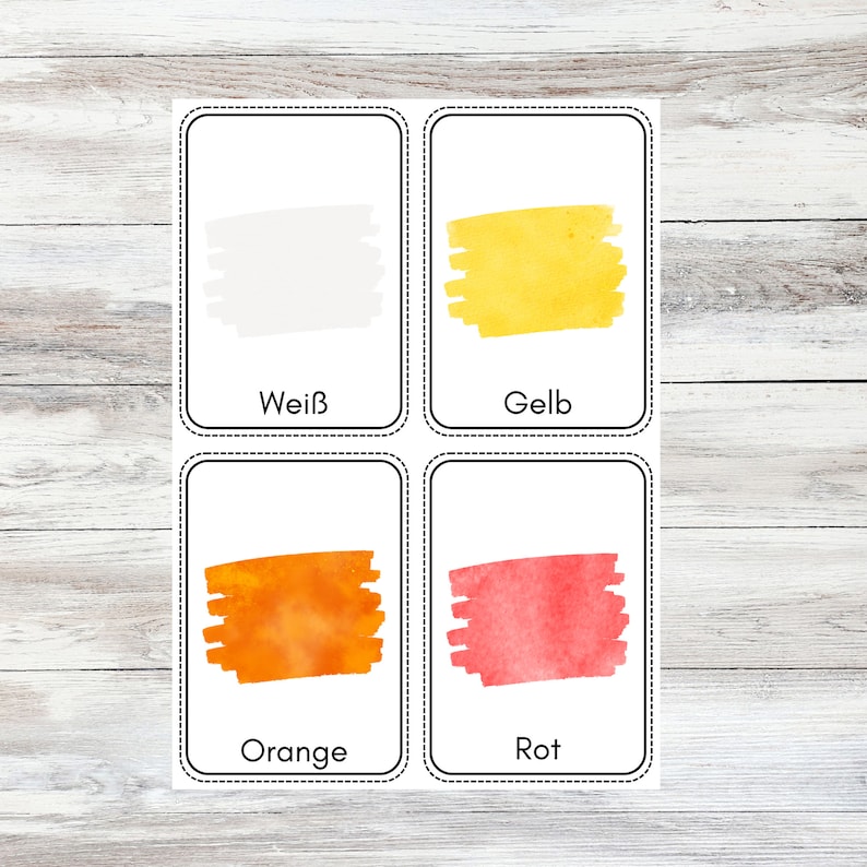 May include: Four color cards with watercolor swatches. The cards are labeled "White", "Yellow", "Orange", and "Red".
