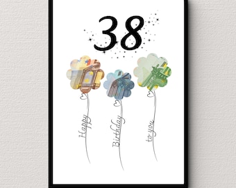 May include: A white card with a black frame, featuring the number 38 in black font surrounded by small black stars. Three stylized flower shapes made of euro banknotes are below the number, with the words "Happy Birthday to you" written in black cursive along the stems.
