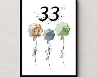 May include: A white card with a black frame, featuring the number 33 in black font surrounded by small black stars. Three stylized flower shapes made of euro banknotes are below the number, with the words "Happy Birthday to you" written in black cursive script.