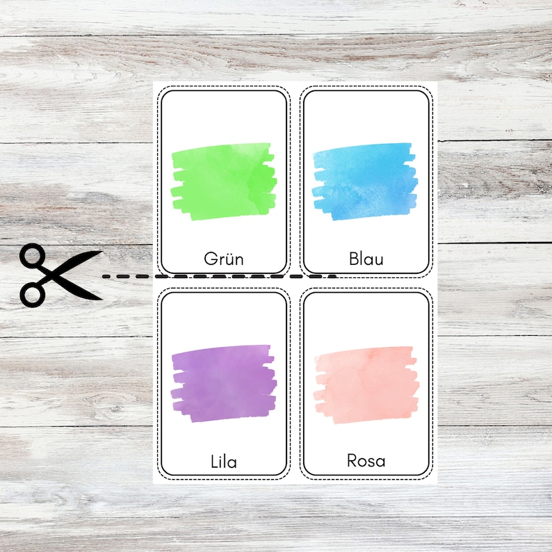 May include: Four color swatches on white cards with German color names: Green (Gr&uuml;n), Blue (Blau), Purple (Lila), and Pink (Rosa).