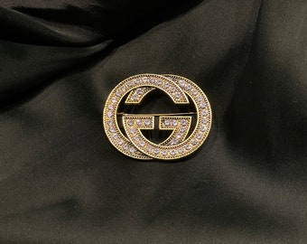 Ausgezeichnete Vintage seltene Gucci Goldbrosche mit Steinen
