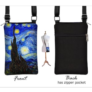May include: A black crossbody bag with a zipper pocket on the back. The front of the bag features a print of Vincent van Gogh's "Starry Night" painting.