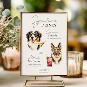 Puede incluir: Un letrero con marco dorado con las palabras "Signature Drinks" en escritura elegante. El letrero presenta ilustraciones de acuarela de dos perros, un cóctel y una bebida mixta. El texto incluye nombres de bebidas e ingredientes, con los nombres "Lisa & Steven" y la fecha "18 de agosto de 2025".