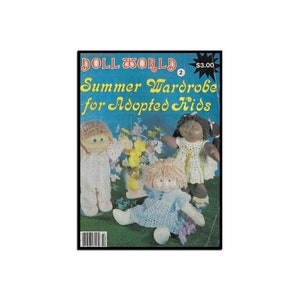 May include: Doll World magazine cover featuring three dolls wearing summer outfits. The magazine title is "Doll World" and the subtitle is "Summer Wardrobe for Adopted Kids".