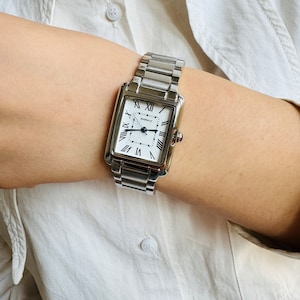 Women Watch Tank Watch Minimalist Watch Gold watch and Silver Watch unique watch gift for her with watch box&gift wrap vintage watch square watchBrand: Quartz watch
Thickness: 8 mm
Band Width: 16mm
Dial diameter: 30mm*24mm
Band Length: 190mm