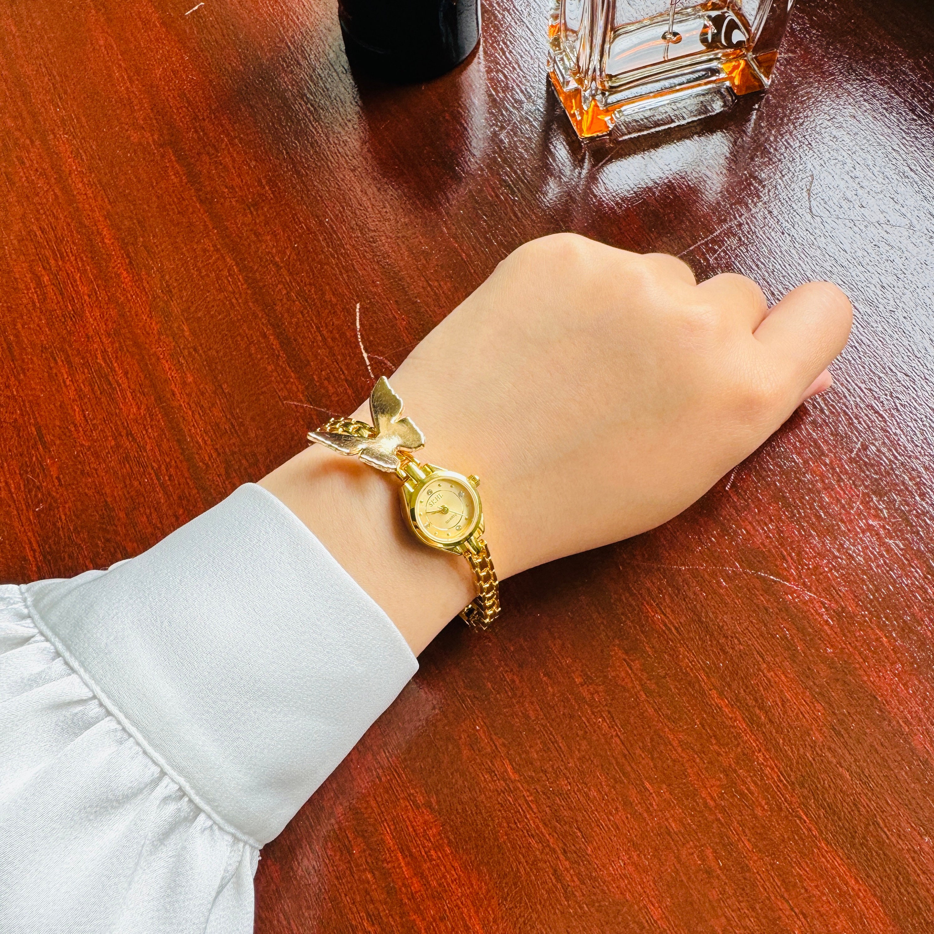 Elegant butterfly gold watch sale