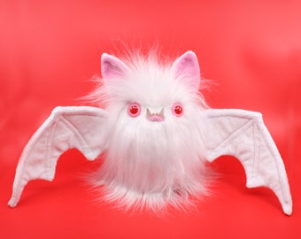 The Bat plush in white and pink