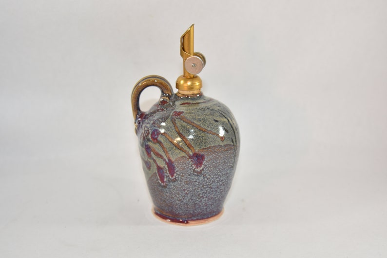 Olive oil cruet. Pouring bottle, ewer, or decanter or dispenser image 1