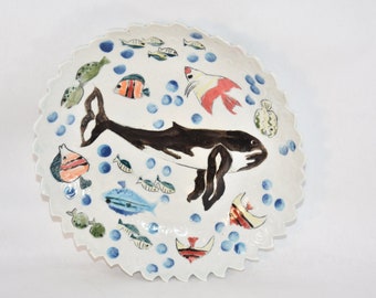 Serving bowl with whale and tropical fish design.