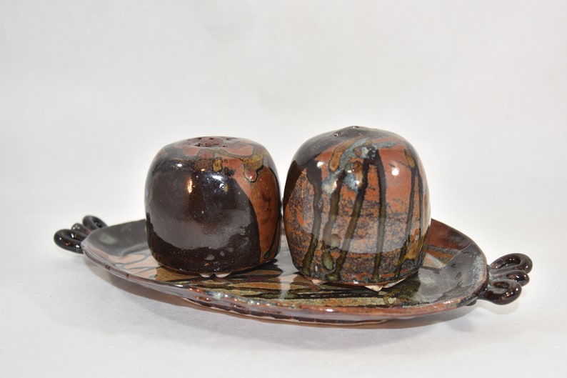 Ceramic Salt and Pepper Shakers on Tray in Rich Browns and Tans image 1