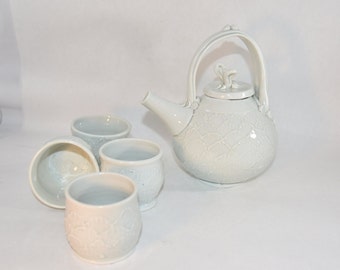 Elegant Porcelain Teapot Set with 4 Teacups