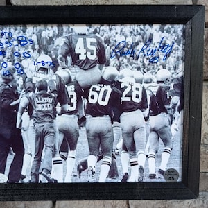 Autographed Rudy Ruettiger 8x10 inch framed photo with certificate of authenticity from JSA