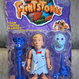 Vintage 1993 Mattel Toys The Flintstones Movie Action Figure in original Box never opened. Barney Rubble