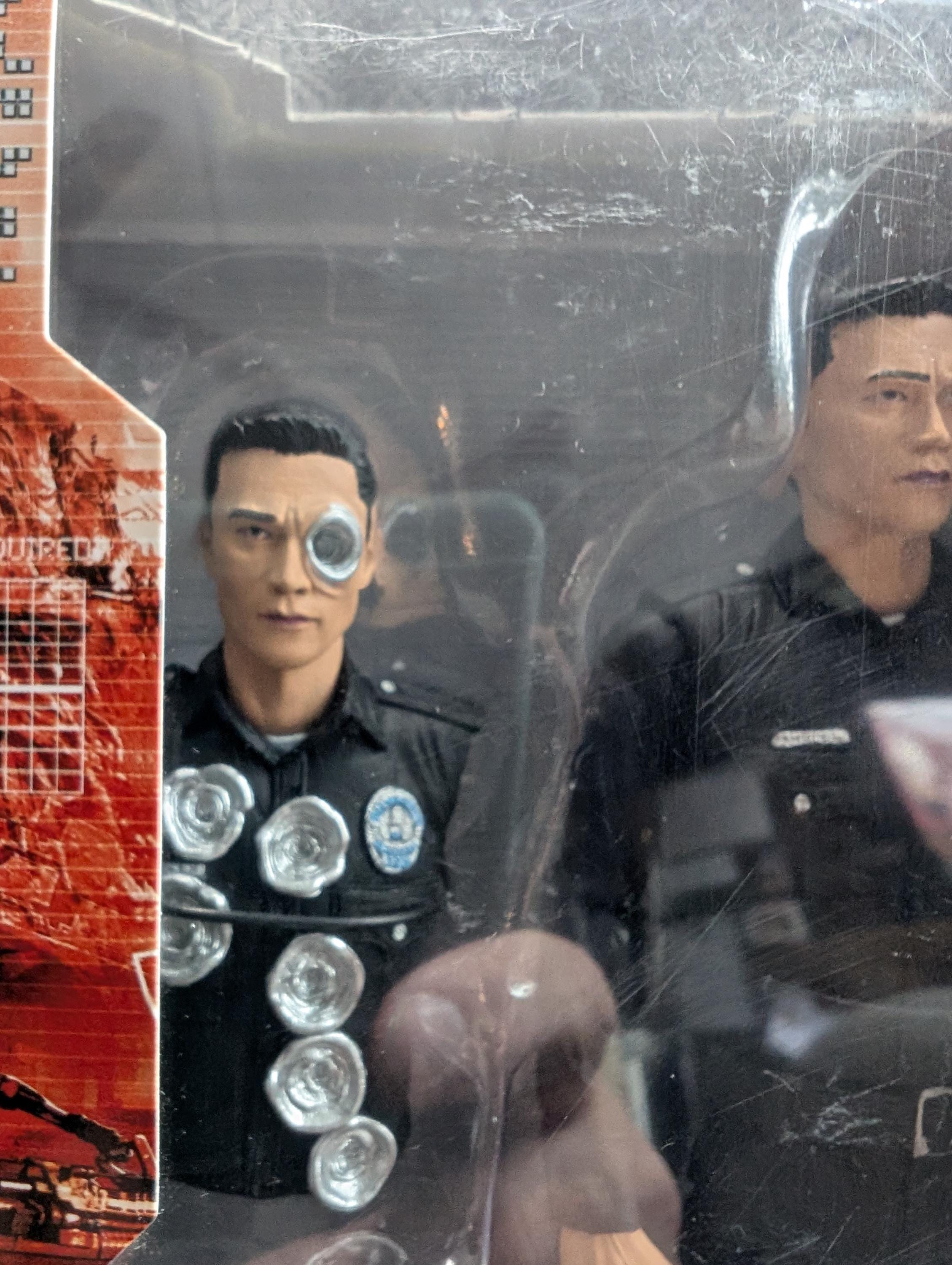 Figurine Terminator Genisys – T-1000 Police Disguise Par NECA (neuve)