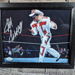 Autographed Jeff Jarrett 8x10 inch framed photo with certificate of authenticity from JSA