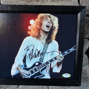 Autographed Peter Frampton 8x10 inch framed photo with certificate of authenticity from PSA