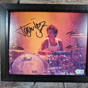 Autographed Tommy Lee Motley Crue Drummer. 8x10 inch photo with certificate of authenticity from Beckett