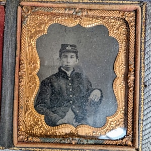 Antique Civil War Tintype photo of a Union soldier in uniform cap has insignia for Company A 153rd regiment Ohio New York Pennsylvania