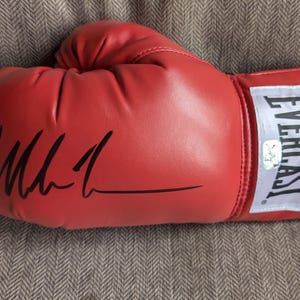 Autographed Mike Tyson Boxing Glove with certificate of authenticity from JSA