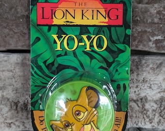 Vintage 1994 Disney's The Lion King Simba Yo-Yo by Spectra Star in original packaging.