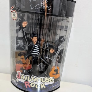 Vintage 2000 X-Toys Elvis Presley Jailhouse Rock 6 inch figure in original box never opened.