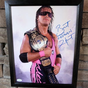 Autographed Bret Hart 11x14 inch framed photo with certificate of authenticity from JSA
