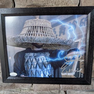 Autographed James Pax Lightning In Big Trouble In Little China 8x10 Inch Framed Photo With Certificate Of Authenticity From JSA