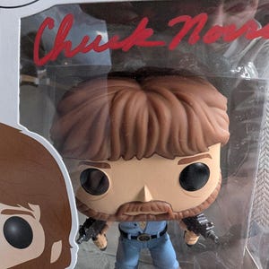 Autographed Chuck Norris Funko Pop with certificate of authenticity from Beckett