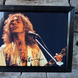 Autographed Peter Frampton 8x10 inch framed photo with certificate of authenticity from PSA