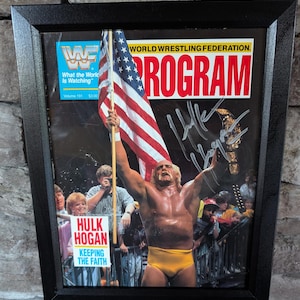 Autographed Hulk Hogan WWF Event Program In An 8 1/2 X 11 inch Frame With certificate of authenticity from JSA