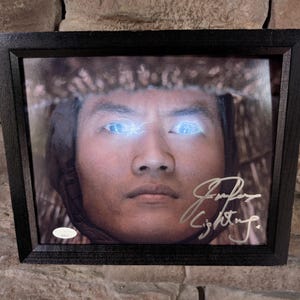 Autographed James Pax Lightning In Big Trouble In Little China 8x10 Inch Framed Photo With Certificate Of Authenticity From JSA