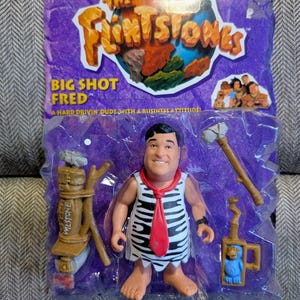 Vintage 1993 Mattel Toys The Flintstones Movie Action Figure in original Box never opened. Fred Flintstone