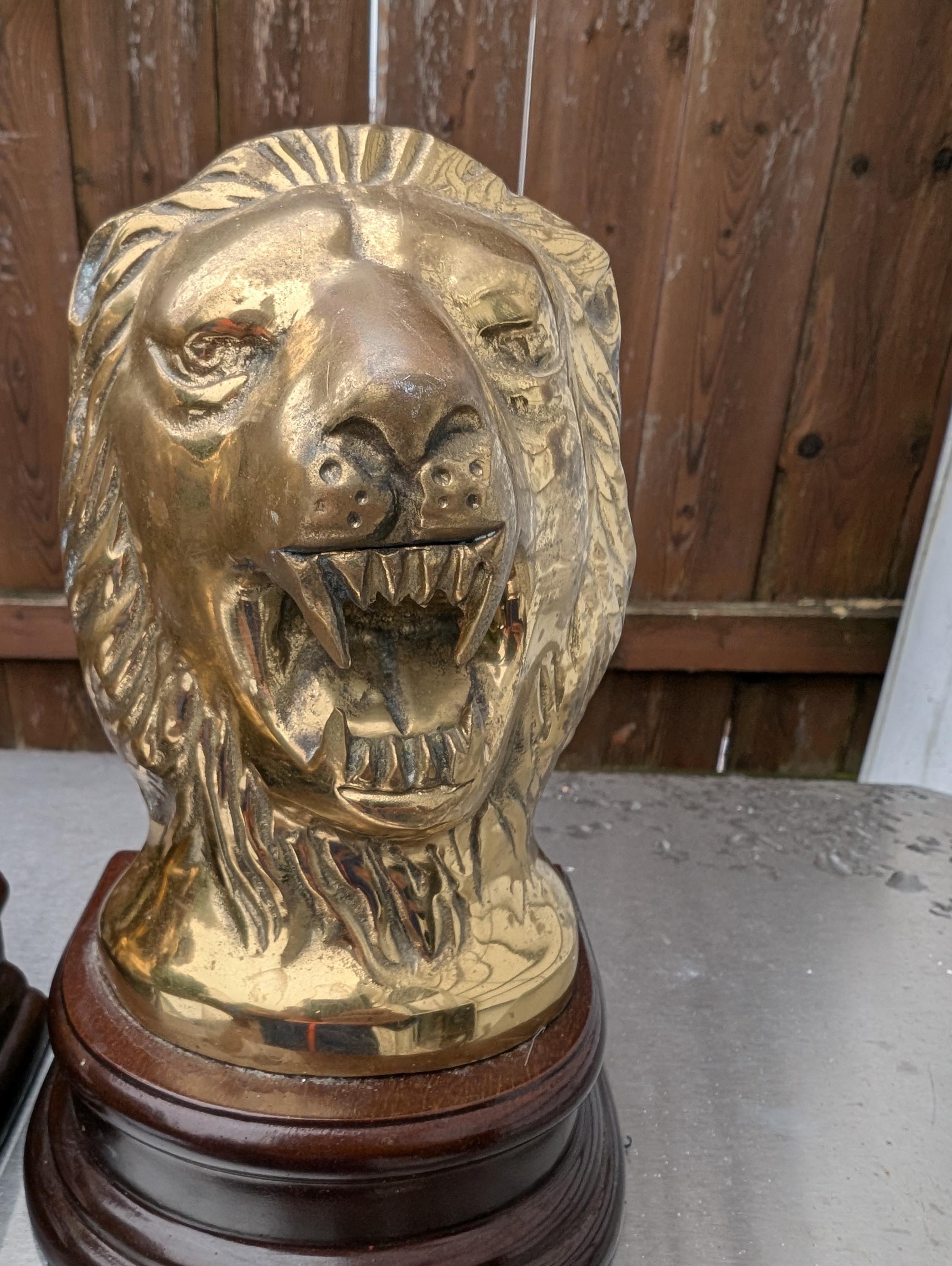 ビンテージの咆哮するライオンのブックエンド。 - Etsy 日本