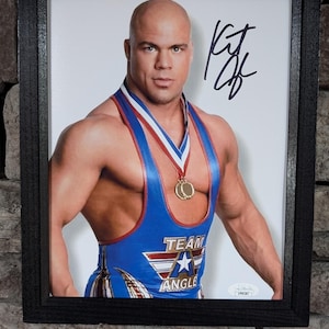 Autographed WWF WWE Olympian Kurt Angle 8x10 inch framed photo with certificate of authenticity from JSA