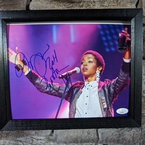 Autographed Lauryn Hill 8x10 inch framed photo with certificate of authenticity from JSA