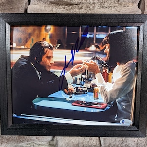 Autographed John Travolta Vincent Vega Pulp Fiction 8x10 inch framed photo with certificate of authenticity from PSA