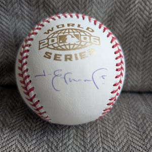 Autographed Jim Edmonds St. Louis Cardinals 2006 Official World Series baseball with certificate of authenticity from TriStar and MLB.